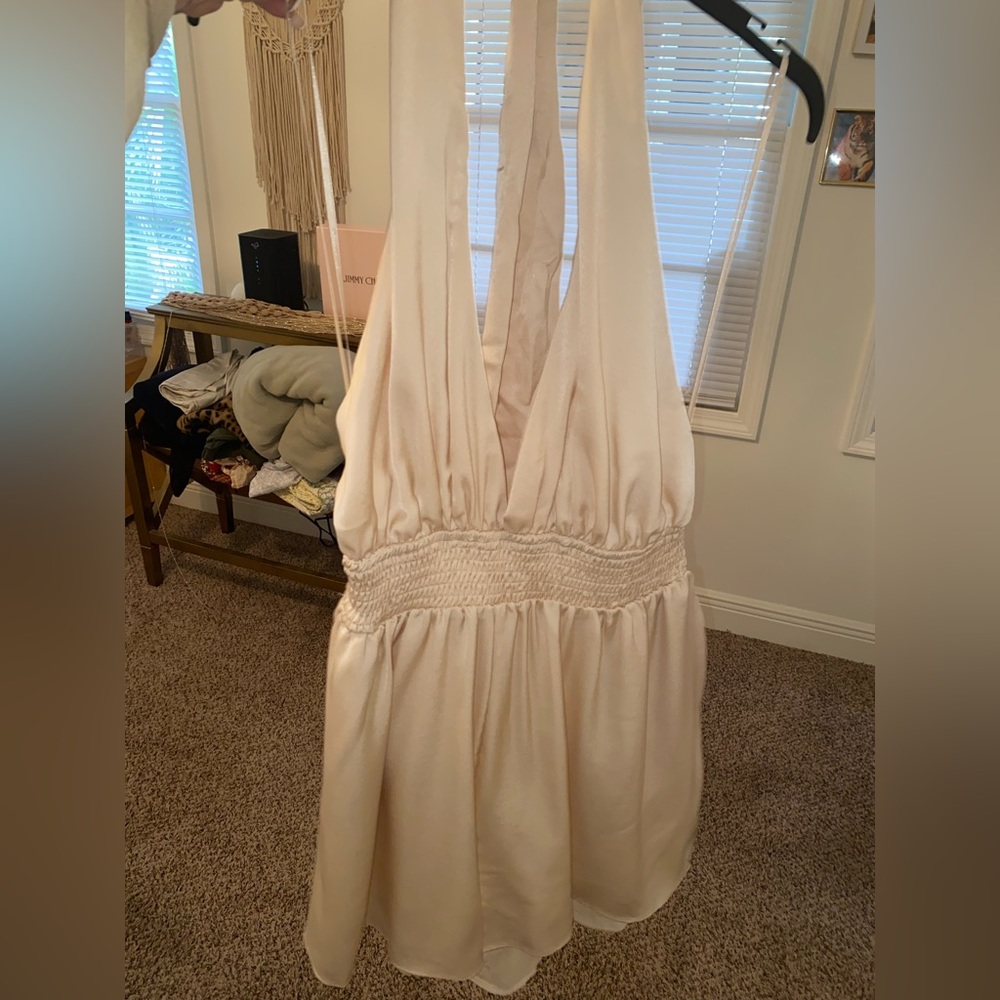 Size Large cream colored romper